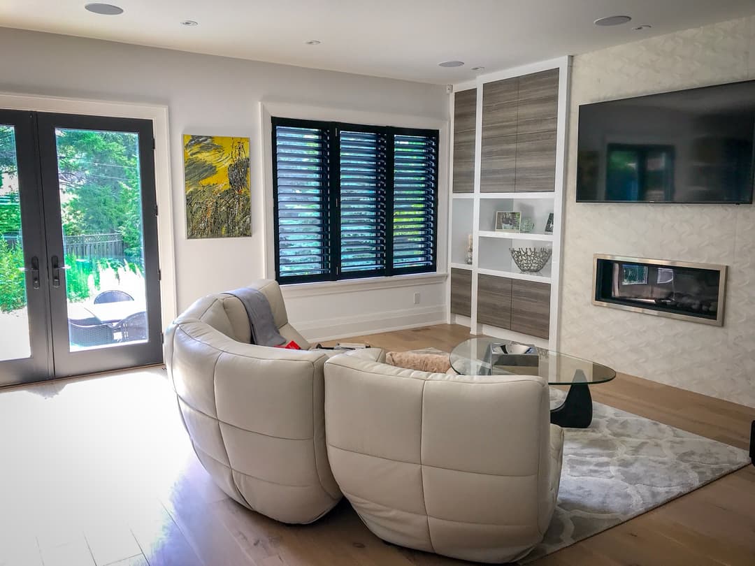 Premium custom California shutters in bedroom window - Toronto